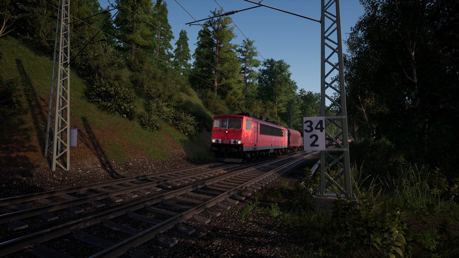 Screenshot aus einem Eisenbahn-Simulator, wobei eine BR 155 auf einem Gleis steht.